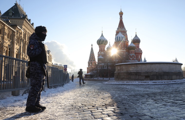 Russian National Guard Service offcers guard the Red Square near the Saint Basile's Cathedral in Moscow