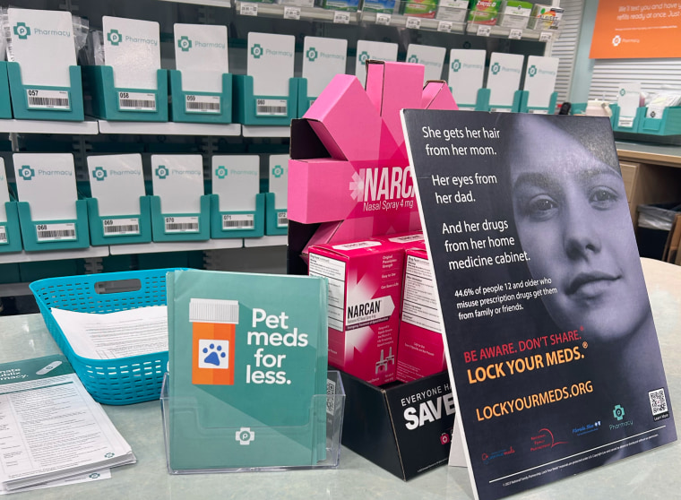 Hiding in plain sight? At a Publix pharmacy in Chattanooga, Tenn., a Narcan display sat on the pharmacy counter, but it was nearly obscured by placards and pamphlets.