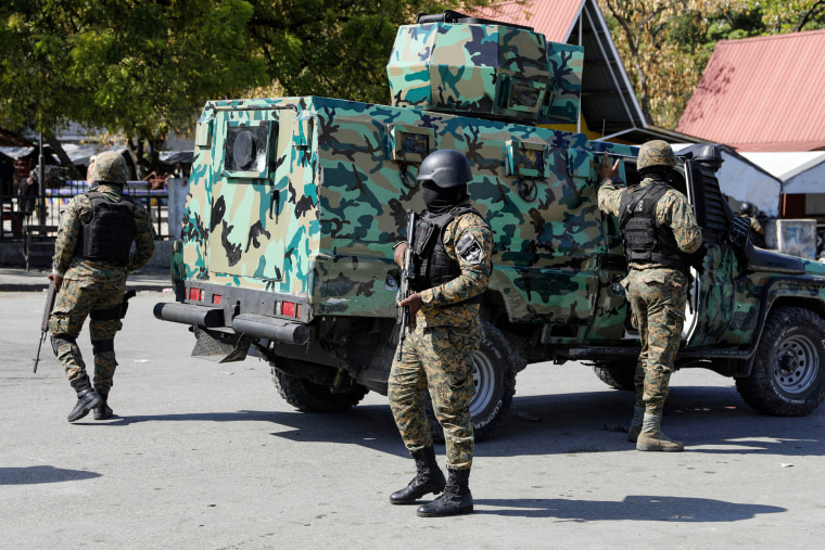 Gangs attack police stations in Haiti as Caribbean leaders call an