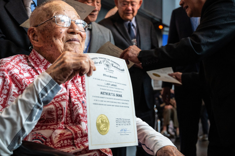 Arthur T.S. Shak, U.S. Army Air Corps, holds his certificate honoring the Congressional Gold Medals received by Chinese American World War II Veterans, on March 9, 2024 in New Orleans.