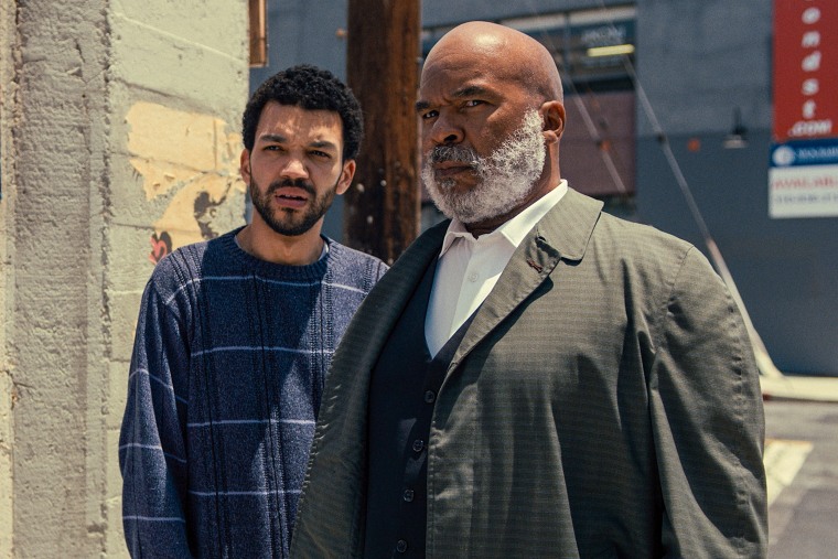 Justice Smith stars as "Aren" and David Alan Grier stars as "Roger" in "The American Society of Magical Negroes."
