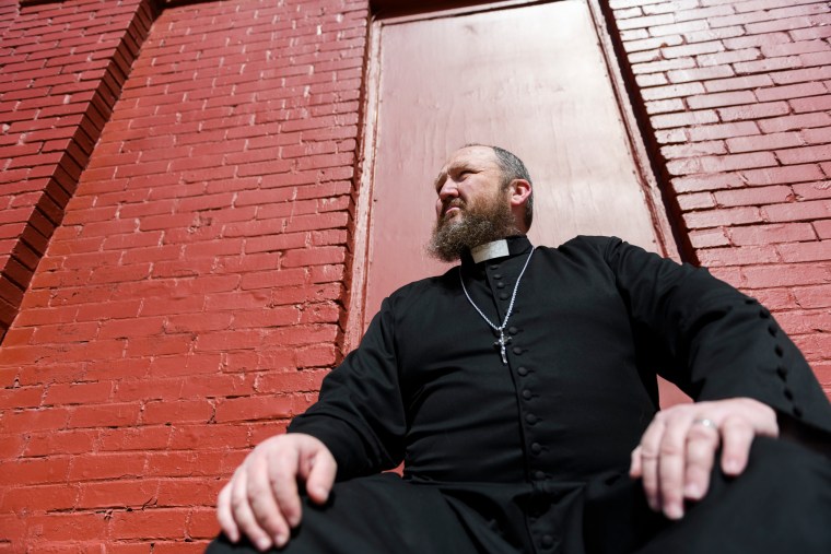 James Neal is known for his embrace of Enid’s LGBTQ community. He calls himself “the weird priest in the dress shouting into the storm.” 