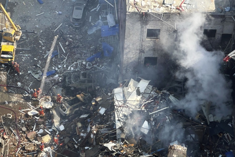 Rescuers were responding to a suspected gas leak explosion Wednesday in a building in northern China, authorities said. 