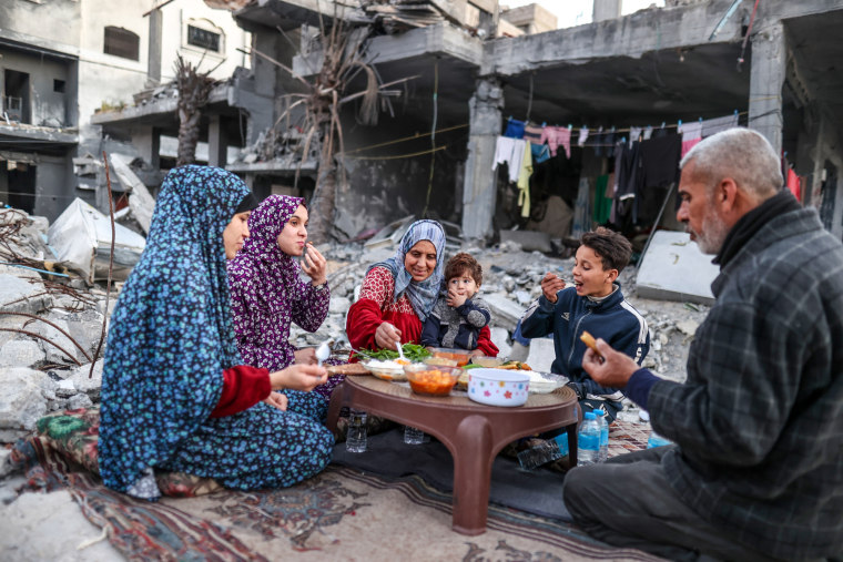 First iftar dinner among rubbles of destroyed buildings in Deir al-Balah