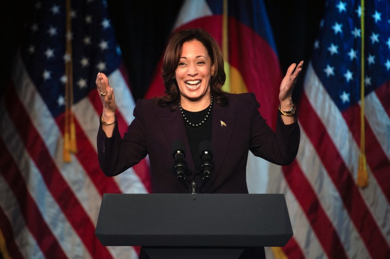 Kamala Harris greets supporters at a campaign rally.