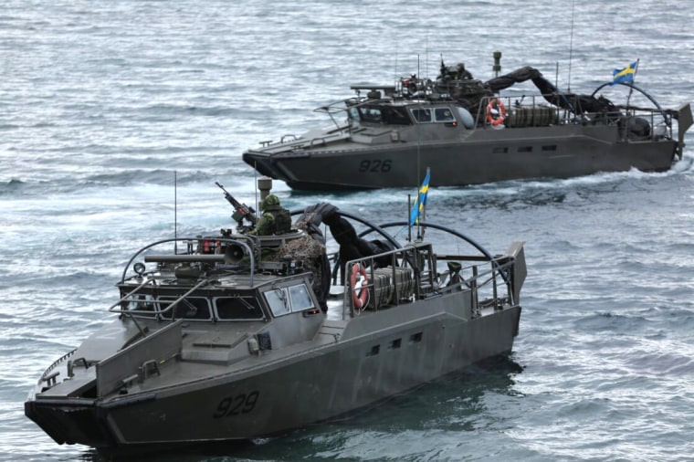 Swedish combat boats approach the Norwegian coast during an amphibious assault exercise.
