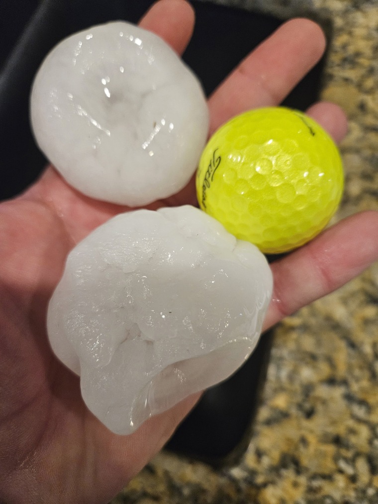 Large chunks of hail compared to the size of a golf ball in Shawnee, Kan., on Wednesday. 