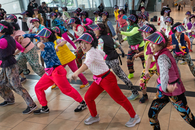 Ajumma dance crew is owning middle age with visors and perms for Women ...