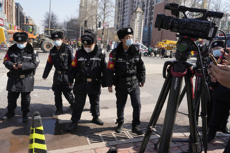 City officials in eastern China have apologized to local journalists after authorities were shown pushing them and trying to obstruct reporting from the site of a deadly explosion, in a rare acknowledgment of state aggression against journalists. 