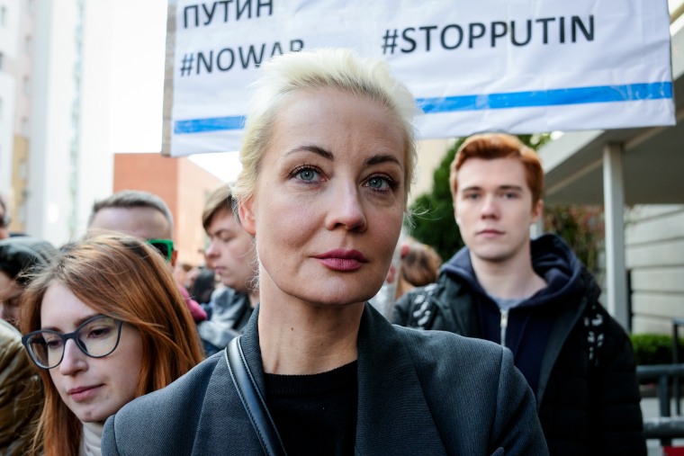 Yulia Navalnaya, widow of Alexey Navalny, stands in a queue