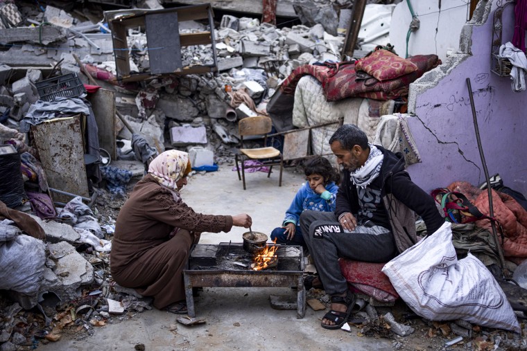 A family breaks their fast during the Muslim holy month of Ramadan