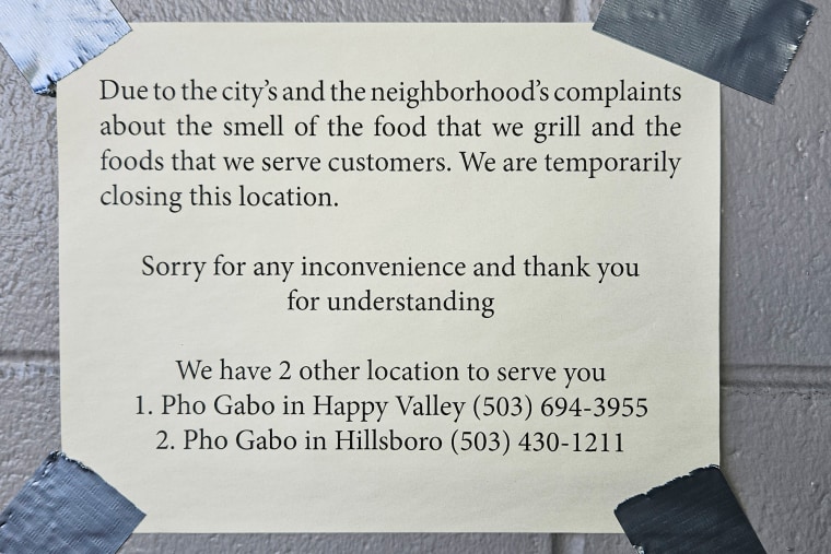 A note left at Pho Gabo's restaurant that reads: "Due to the city's and the neighborhood's complaints about the smel of the food that we grill and the foods that we serve customers. We are temporarily closing this location."