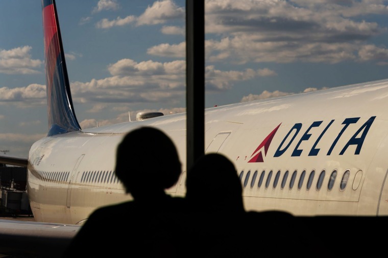 Travelers At HartsfieldJackson Atlanta International Airport As Congress Averts FAA Lapse With Stopgap Passage