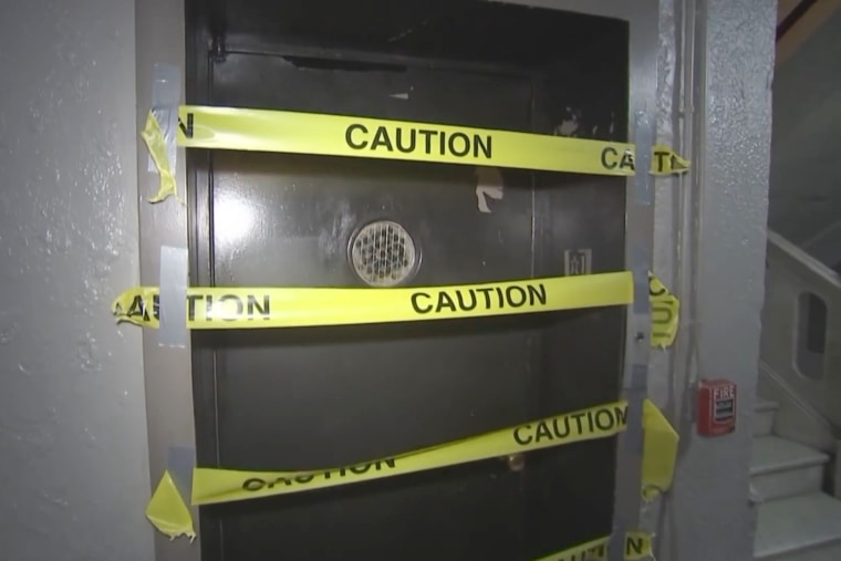 Caution tape over the elevator.