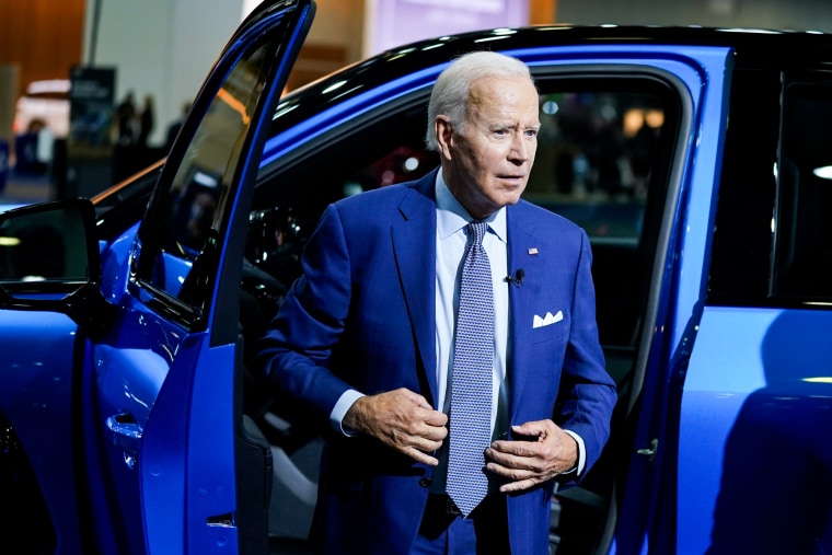 President Joe Biden gets out of a vehicle