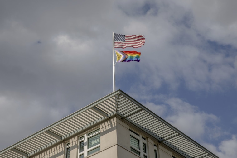 A symbol of unity and inclusiveness adorns the front of the U.S. Embassy in Berlin on June 28, 2023.