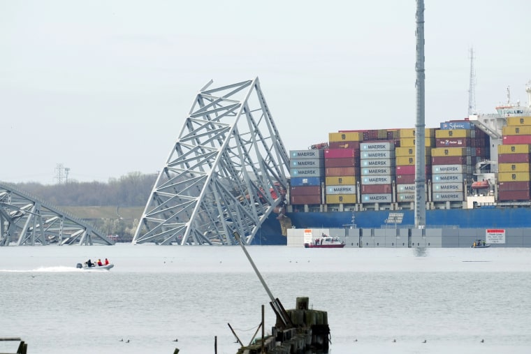The cargo ship that struck the Francis Scott Key Bridge is surrounded by wreckage, in Baltimore
