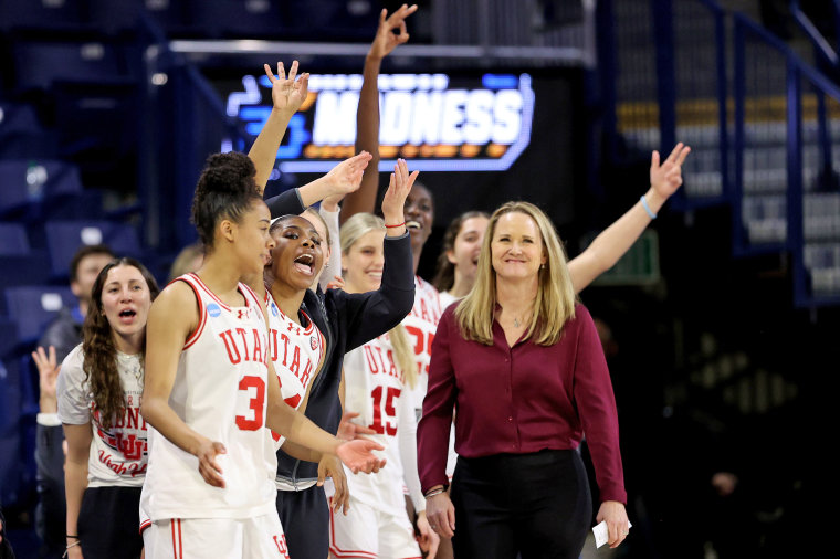 The Utah Utes celebrate after a basket against South Dakota State  in the first round of the NCAA Women's Basketball Tournament  on March 23, 2024.