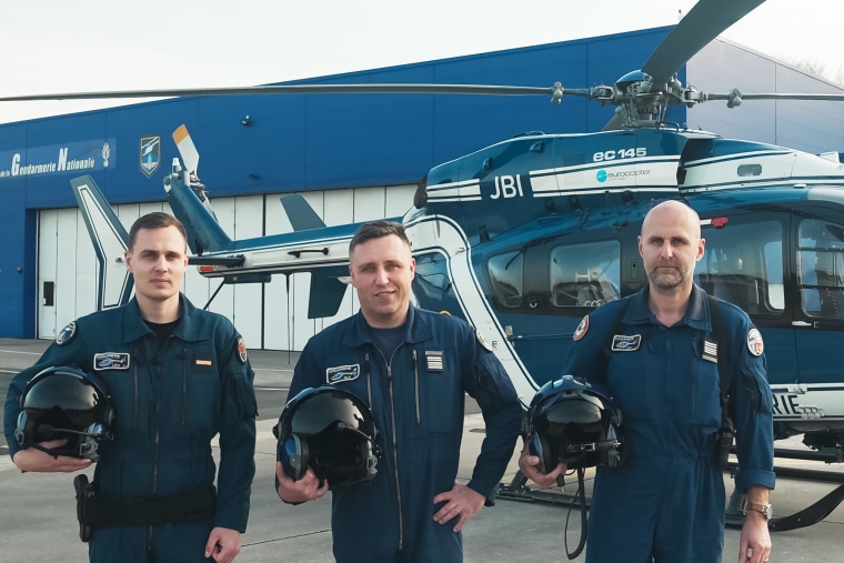 French helicopter pilots Maj. John, center, and Col. Dry, right, at an army base on the outskirts of Paris last week.