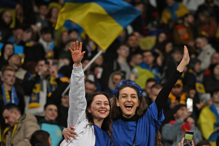 Ukrainian fans celebrate after their team defeated Iceland in Wroclaw, Poland, on March 26, 2024. 