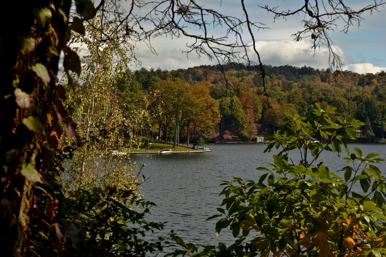 Lake Toxaway during the beginnings of leaf changes in the fall.