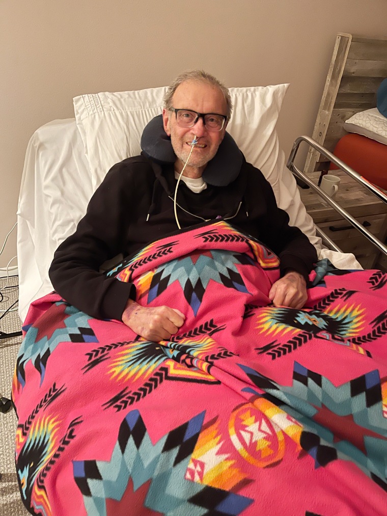 Dr. Gary Gibbon recovering from the double lung and liver transplant.