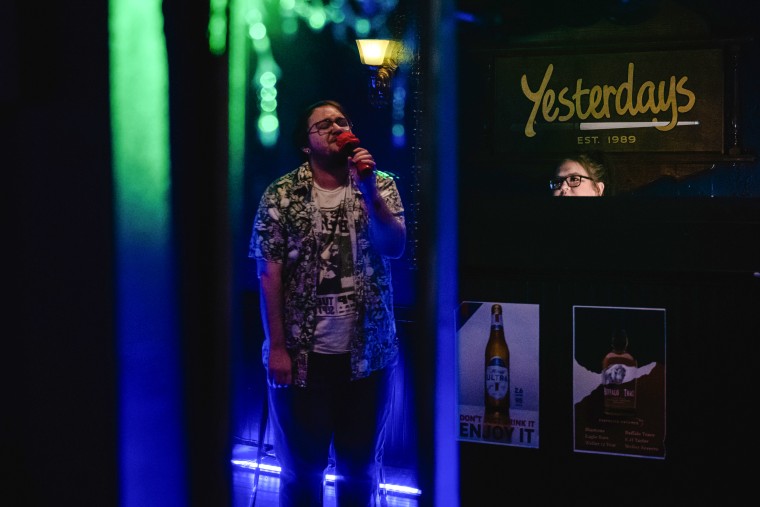 Oliver Bertasio sings at a karaoke bar