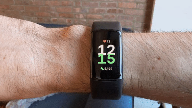 A close up video of a man swiping through the screen of the Fitbit Charge 6 to show different apps, including notifications, exercise, alarms, timers, EDA scan, ECG, Google Maps, and YouTube Music.