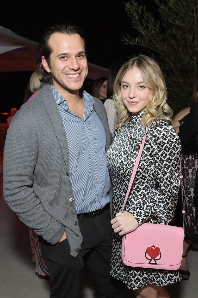 Jonathan Davino (L) and Sydney Sweeney attend the InStyle and Kate Spade dinner at Spring Place on October 23, 2018 in Los Angeles, California. 