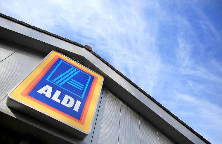 An exterior view of signage at a branch of the budget supermarket Aldi.