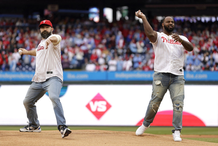 Recently retired Philadelphia Eagles legends Jason Kelce and Fletcher Cox throw out the first pitch before a game between the Atlanta Braves and Philadelphia Phillies at Citizens Bank Park on March 30, 2024 in Philadelphia, Pennsylvania.