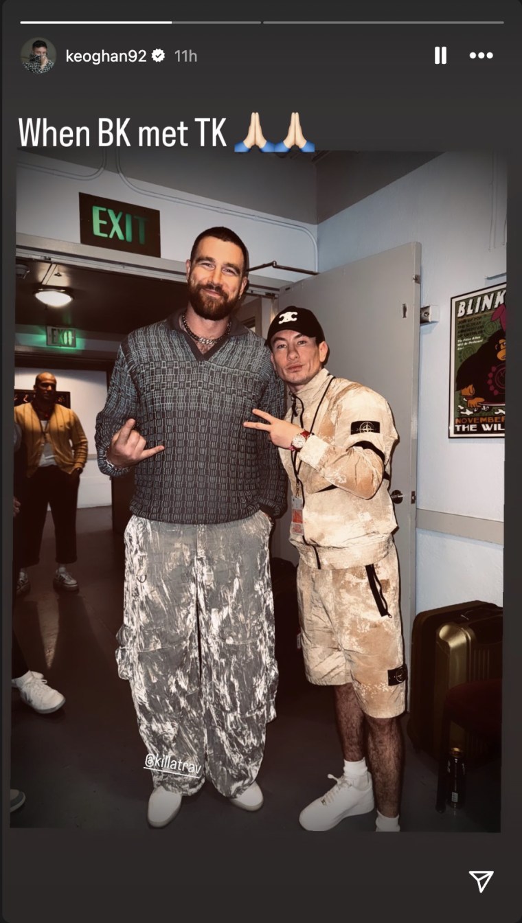 Travis Kelce and Barry Keoghan pose for a picture.