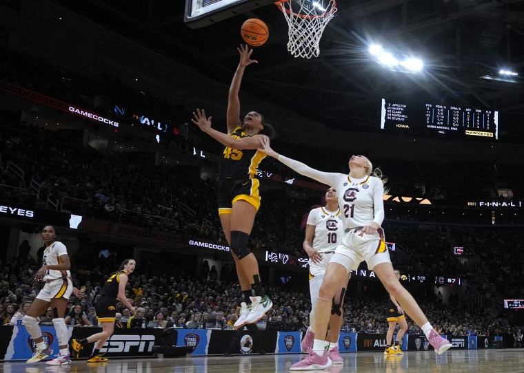 Iowa forward Hannah Stuelke #45 shoots over South Carolina forward Chloe Kitts #21 during the second half of the championship game. 