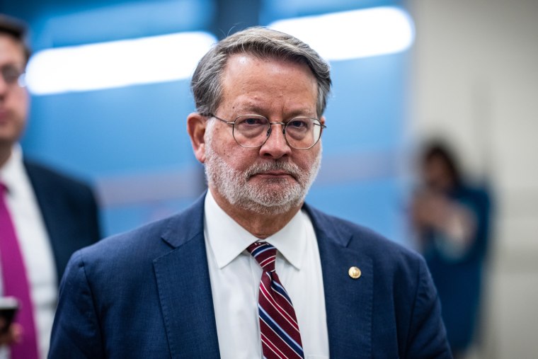 Sen. Gary Peters, D-Mich., arrives in the U.S. Capitol for a vote