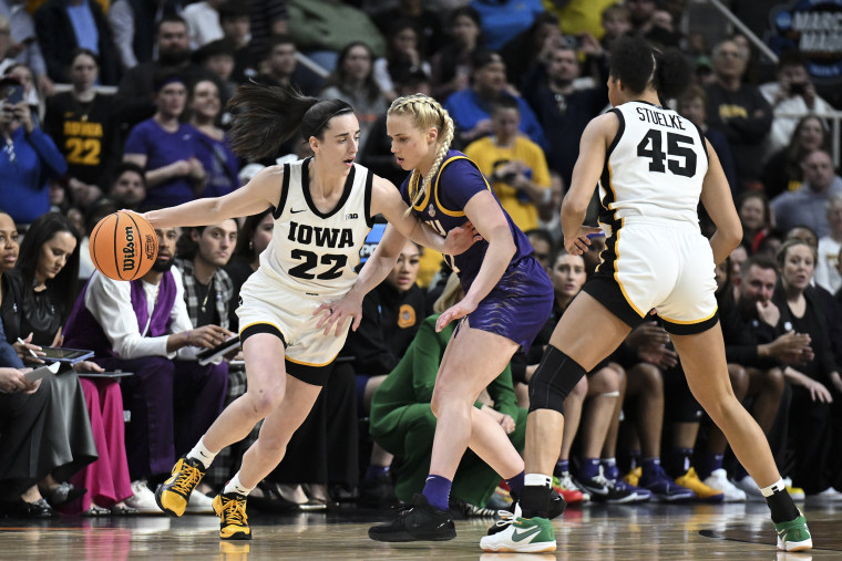 Iowa guard Caitlin Clark drives against LSU guard Hailey Van Lith  during the first quarter of an Elite Eight round college basketball game during the NCAA Tournament, Monday, April 1, 2024, in Albany, N.Y. 