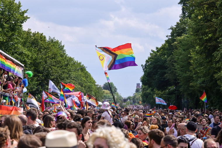 An intersex-inclusive Pride flag is waved during the annual Christopher Street Day parade on July 22, 2023 in Berlin, Germany. 