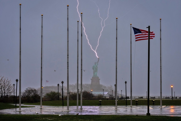 Lightning strikes the Statue of Liberty in New York on Apri 3, 2024.