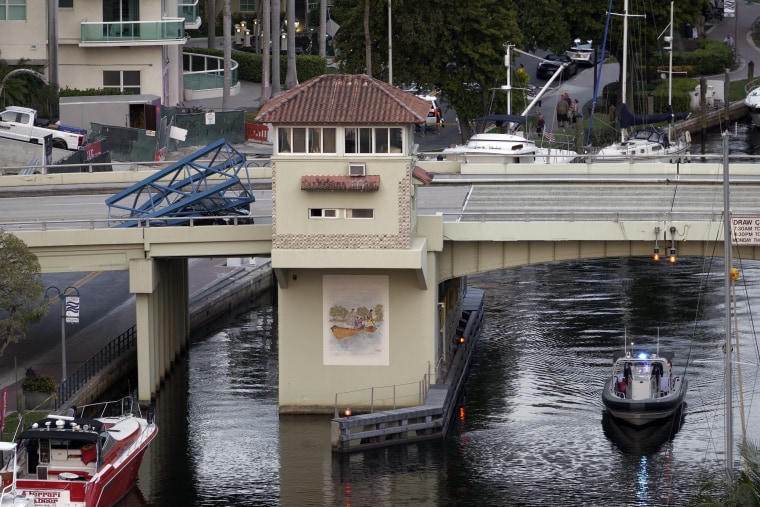 A construction worker was killed and two people were taken to the hospital after a portion of a crane dropped onto the Southeast Third Avenue bridge over the New River in downtown Fort Lauderdale, Fla., Thursday, April 4, 2024.