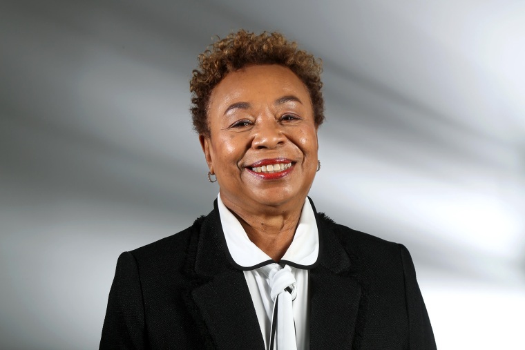 Rep Barbara Lee smiles while posing for a portrait