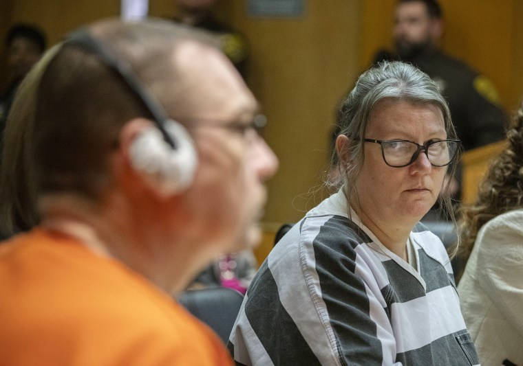 Jennifer Crumbley looks at her husband, James Crumbley, during their sentencing on April 9, 2024 at Oakland County Circuit Court in Pontiac, Mich.