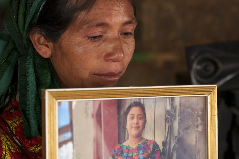 Olivia Orozco Lopez holds a portrait of her late daughter Celestina Carolina during an interview in the Culvilla hamlet of Tejutla, Guatemala