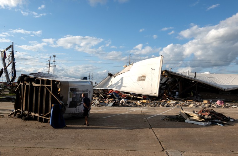 A strip mall is damaged by a tornado in Katy, Texas