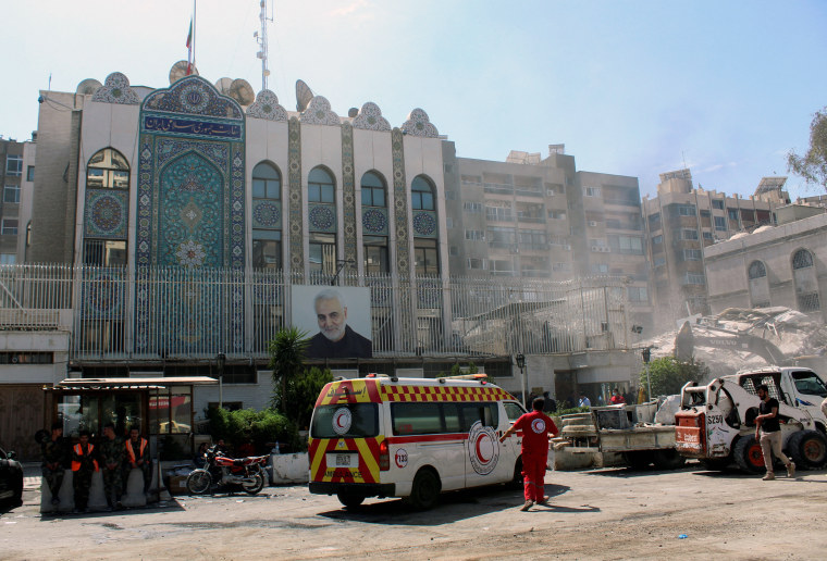 FILE PHOTO: An ambulance is parked outside the Iranian embassy in Damascus