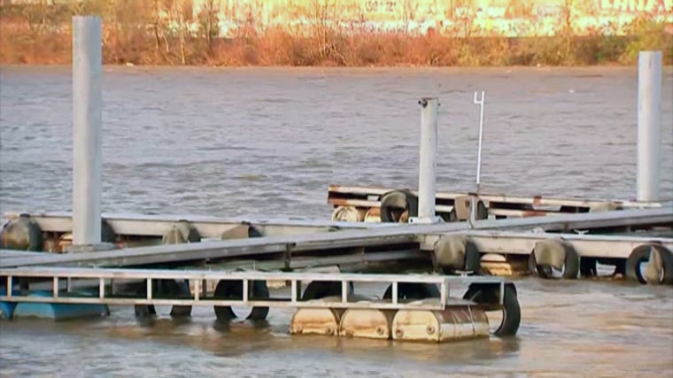 An investigation is underway after 26 barges broke loose on the Ohio River.
