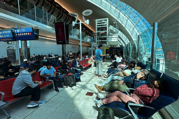 Dubai's major international airport diverted scores of incoming flights on April 16 as heavy rains lashed the United Arab Emirates, causing widespread flooding around the desert country.