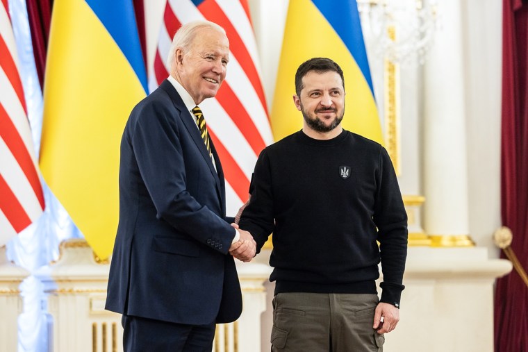 US President Biden shakes hands with Volodymyr Zelenskyy
