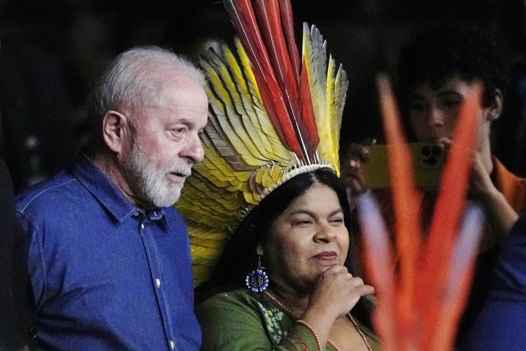 Brazil's President Luiz Inacio Lula da Silva and Minister of Indigenous Peoples Sonia Guajajara arrive at the closing ceremony of the 1st Ordinary Meeting of the National Council for Indigenous Policy
