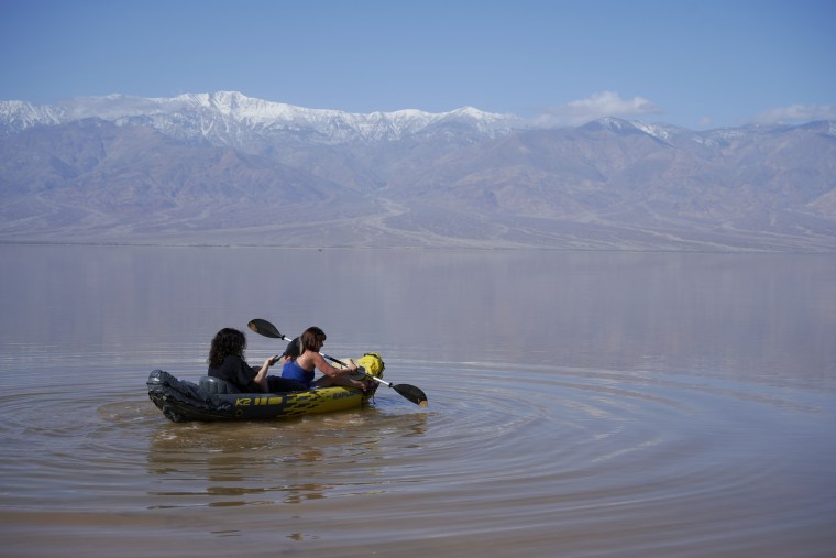Kayakers on Lake Manly in Death Valley National Park on Feb. 27, 2024.