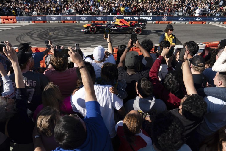 Grand Prix-winning driver David Coulthard drives the RB7 racing car that won the 2011 Formula One championship during a demonstration along Pennsylvania Avenue in Washington, Saturday, April 20, 2024. 