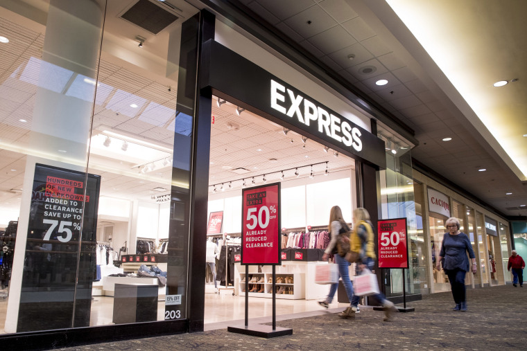 People enter an Express retail clothing store in Valley West Mall, on Jan. 22, 2020, in West Des Moines, Iowa.